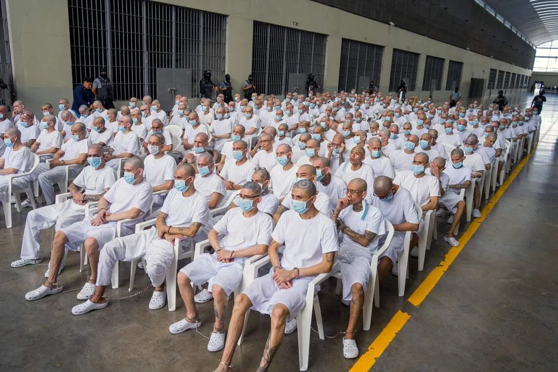Alleged members of the Mara Salvatrucha (MS-13) during a remote court hearing via video link from the Counter-Terrorism Confinement Center (CECOT) mega-prison in Tecoluca, El Salvador, on April 20.