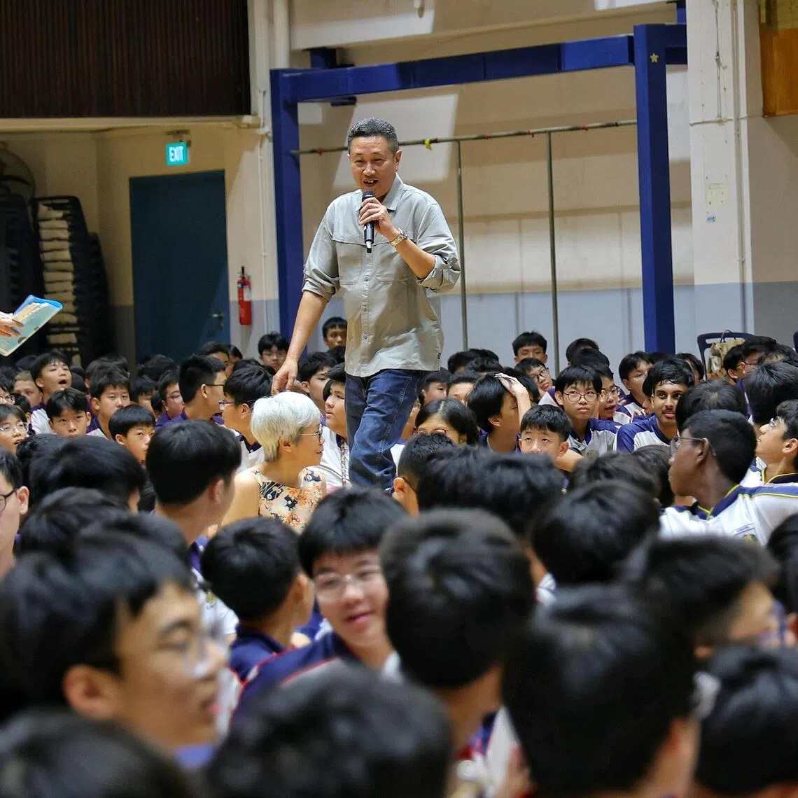 ST senior crime correspondent Zaihan Mohamed Yusof telling students at St Gabriel’s Secondary School about the time he was mistaken for a spy, during a What’s The News? assembly programme on Aug 28.