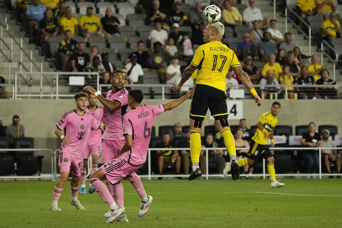 Aug 13, 2024; Columbus, Ohio, USA;  Columbus Crew forward Christian Ramirez (17) heads a ball over Inter Miami CF defender Tomas Aviles (6) during the second half of the Leagues Cup round of 16 game at Lower.com Field. The Crew won 3-2. Mandatory Credit: Adam Cairns/Columbus Dispatch-USA TODAY Sports