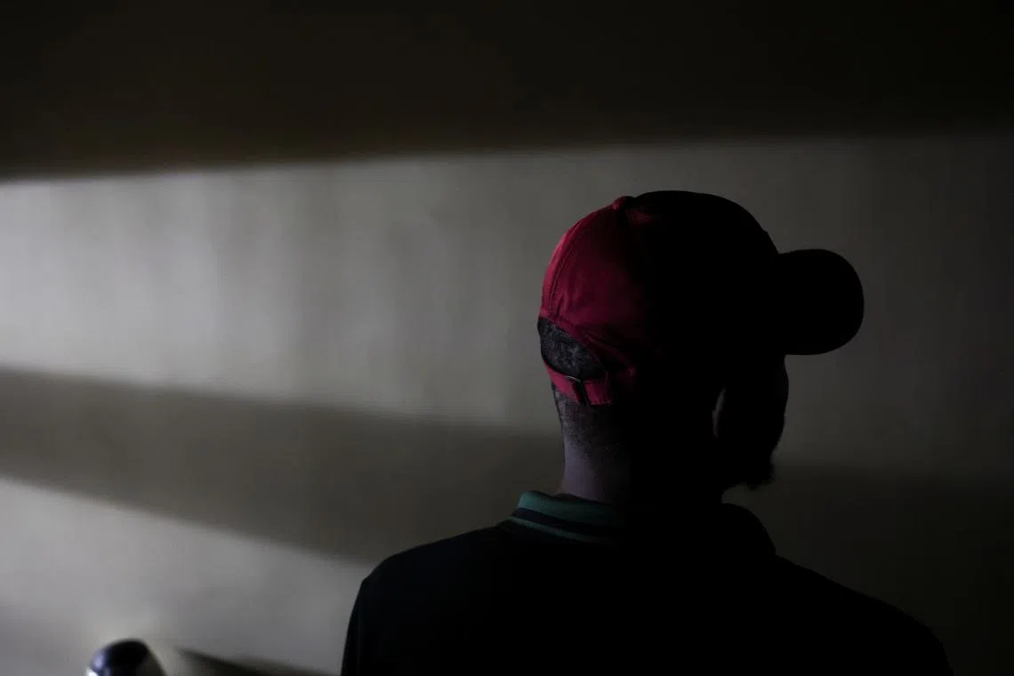 A person who contracted Human Immunodeficiency Virus (HIV) after losing access to Pre-exposure Prophylaxis (PrEP), poses for a photo in Asaba, Delta State, Nigeria, May 31, 2025. REUTERS/Sodiq Adelakun