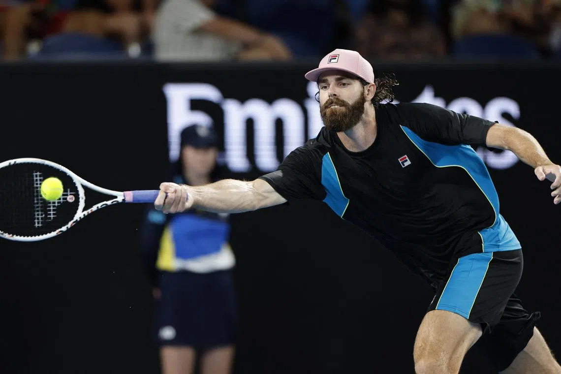 FILE PHOTO: Tennis - Australian Open - Melbourne Park, Melbourne, Australia - January 12, 2025 Reilly Opelka of the U.S. in action during his first round match against Belgium's Gauthier Onclin REUTERS/Francis Mascarenhas/ File Photo