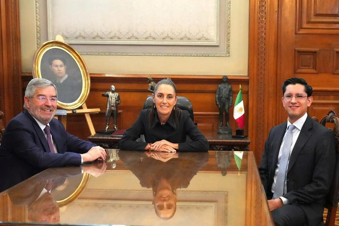 Mexican President Claudia Sheinbaum is flanked by outgoing Foreign Minister Juan Ramon de la Fuente and new Foreign Minister Roberto Velasco at the National Palace in Mexico City, Mexico, April 1, 2026. Presidencia de Mexico/Handout via REUTERS