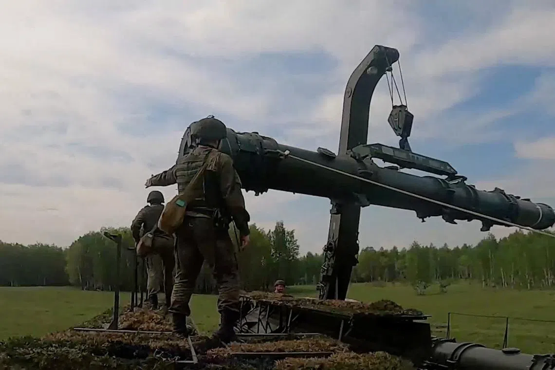 Russian service members take part in a nuclear forces exercise at an unidentified location in Russia, in this still image taken from handout footage released on May 20, 2026.  Russian Defence Ministry/Handout via REUTERS