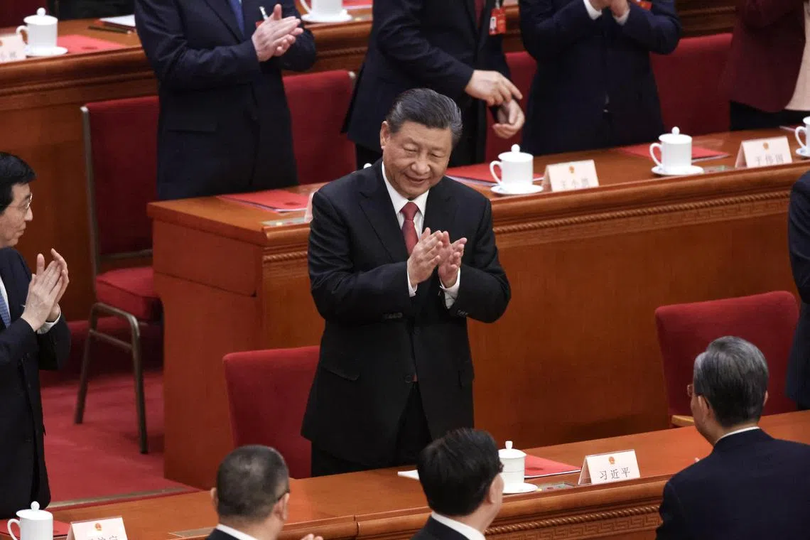 epa11213954 Chinese President Xi Jinping claps at the end of the closing meeting of the second session of the 14th National People's Congress (NPC) at the Great Hall of the People in Beijing, China, 11 March 2024. China holds two major annual political meetings, the National People's Congress (NPC) and the Chinese People's Political Consultative Conference (CPPCC), which run alongside each other and are known as 'Lianghui' or 'Two Sessions.'  EPA-EFE/ANDRES MARTINEZ CASARES