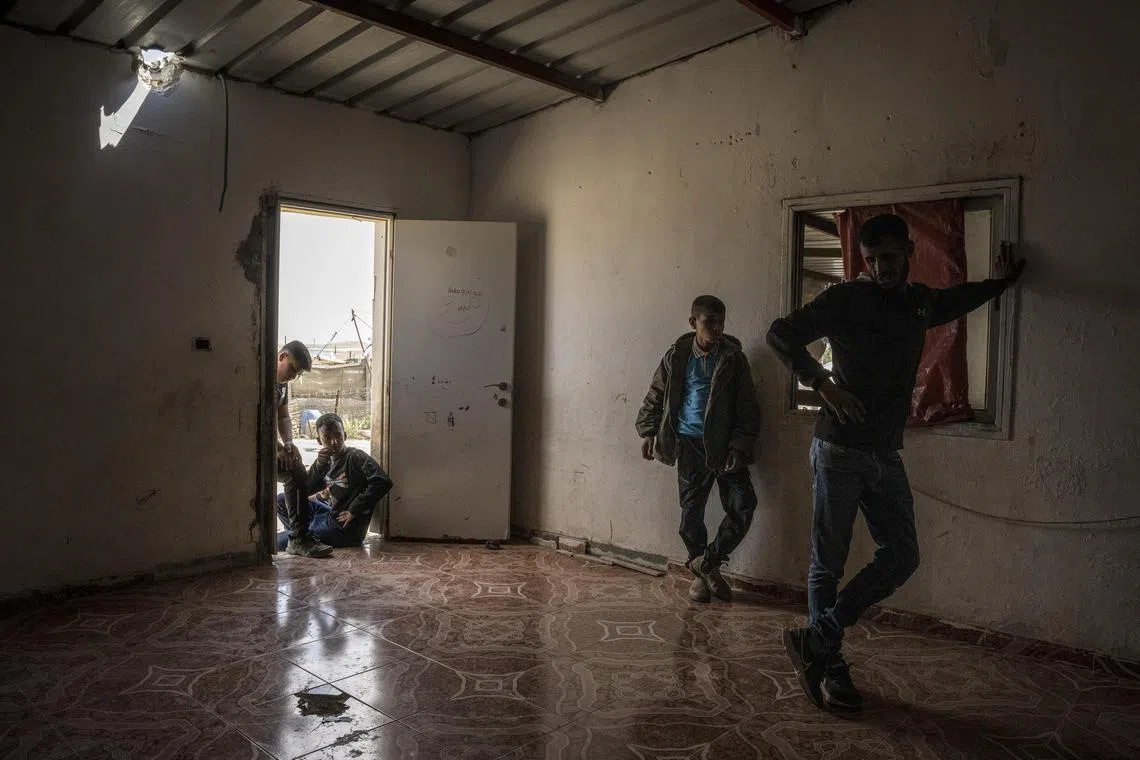 Holes in the roof and floor at the home of Amina al-Hasoni, a 7-year-old girl who was injured by missile shrapnel outside Arad, Israel, on April 14.