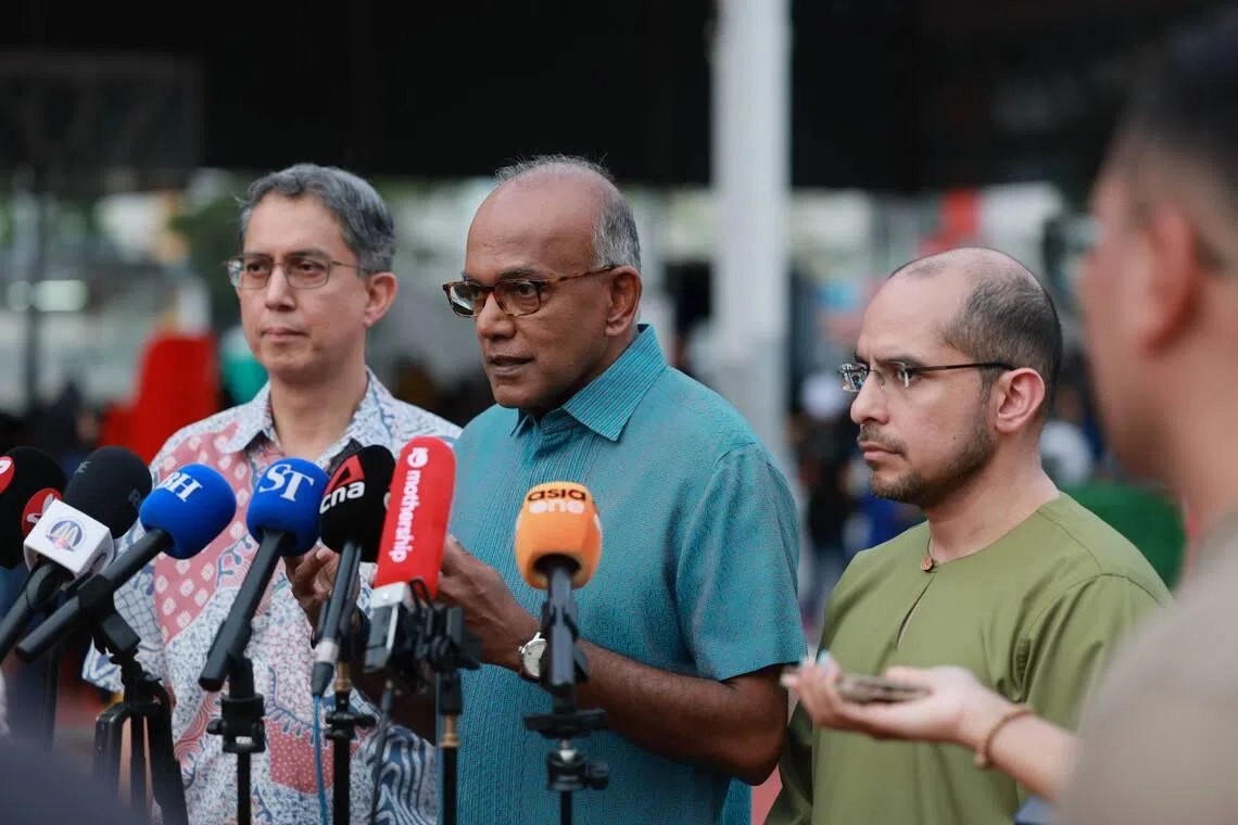 Home Affairs Minister K. Shanmugam (centre) speaking to the media on March 8. With him are Acting Minister-in-charge of Muslim Affairs Muhammad Faishal Ibrahim (left) and Nee Soon GRC MP Syed Harun Alhabsyi.
