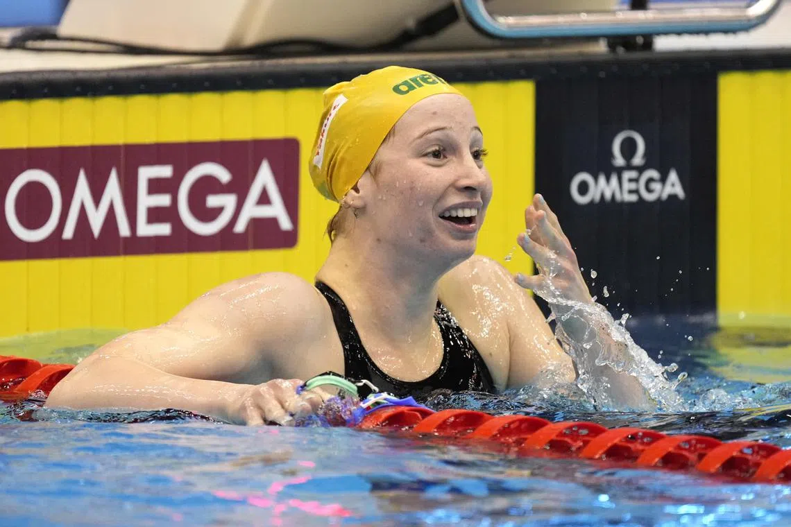 Mollie O'Callaghan of Australia reacts after setting a new world record in the women's 200m freestyle.