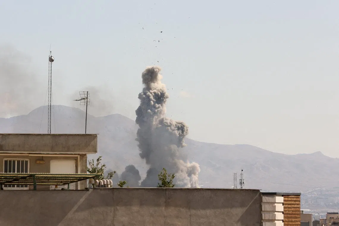 Smoke rises following an explosion, after Israel and the U.S. launched strikes on Iran, in Tehran, Iran, March 1, 2026. Majid Asgaripour/WANA (West Asia News Agency) via REUTERS