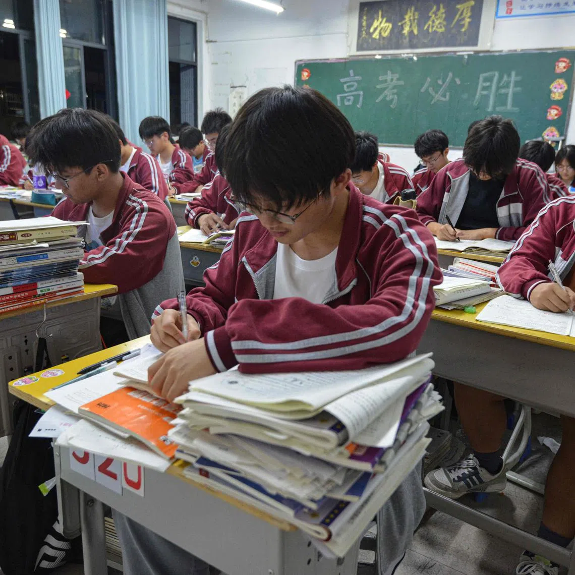 High school students prepare for the National College Entrance Examination, known as "gaokao", in Fuyang, Anhui, on May 27.