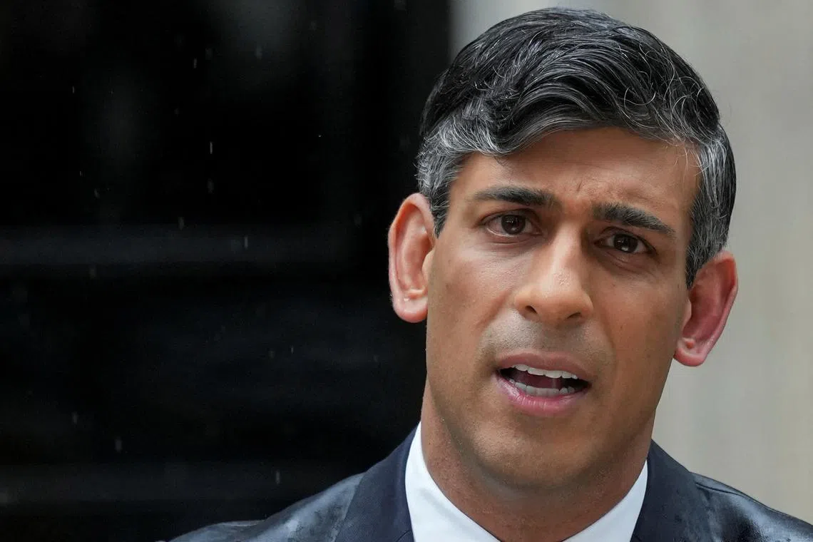 FILE PHOTO: British Prime Minister Rishi Sunak delivers a speech calling for a general election, outside Number 10 Downing Street, in London, Britain, May 22, 2024. REUTERS/Maja Smiejkowska/File Photo