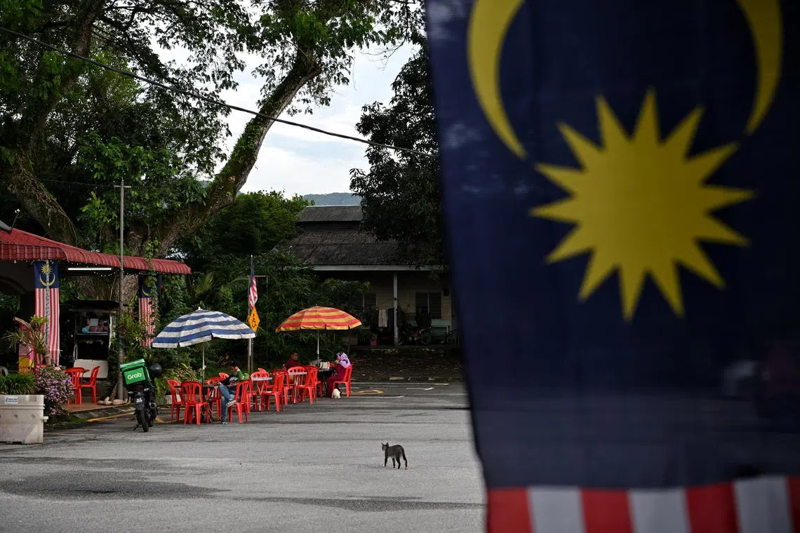 Controversy erupted over a plan to make the requirement compulsory for outlets that do not serve pork or alcohol.