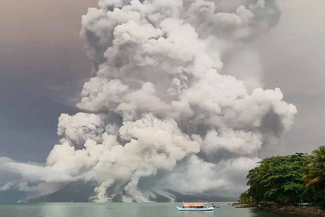 An eruption from Mount Ruang volcano is seen from Tagulandang island in Sitaro, North Sulawesi, on April 30, 2024.
