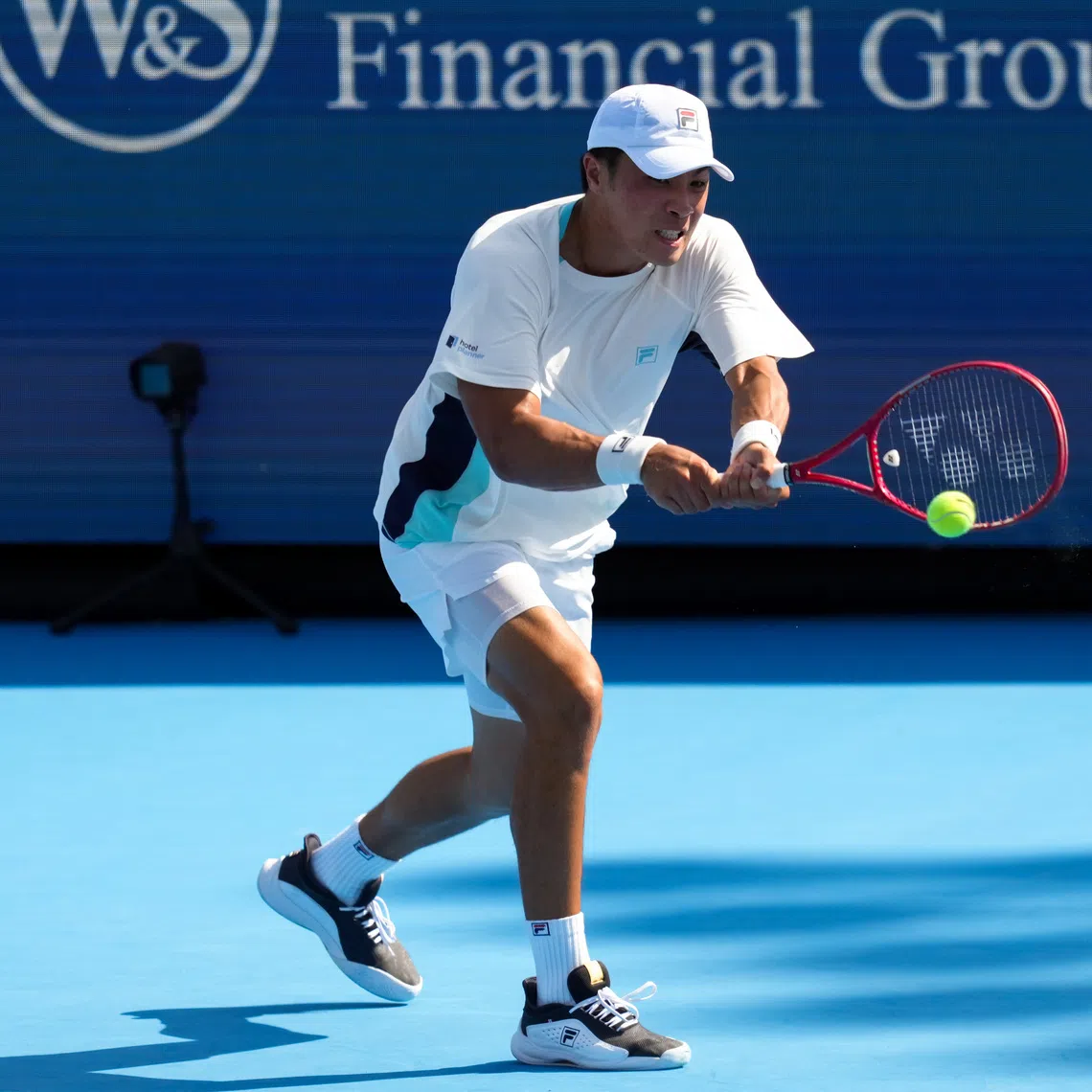 Aug 18, 2026; Mason, OH, USA;  Brandon Nakashima (USA) returns a shot against Daniil Medvedev during the Cincinnati Open at Lindner Family Tennis Center. Mandatory Credit: Aaron Doster-Imagn Images