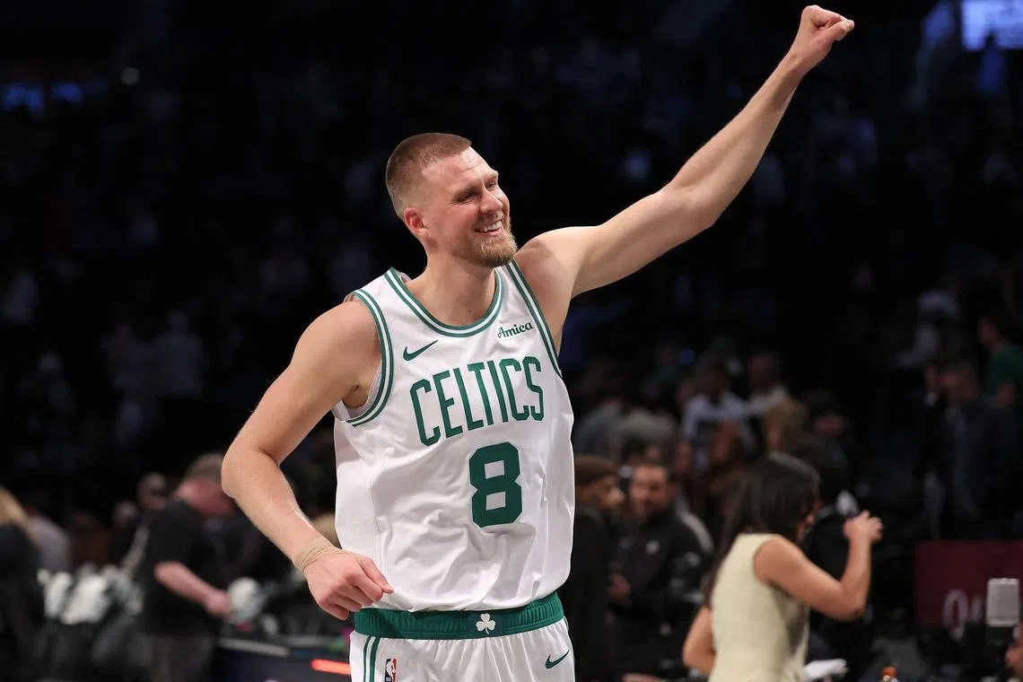 Kristaps Porzingisof the Boston Celtics celebrates the win after the game against the Brooklyn Nets at Barclays Centre on March 15.