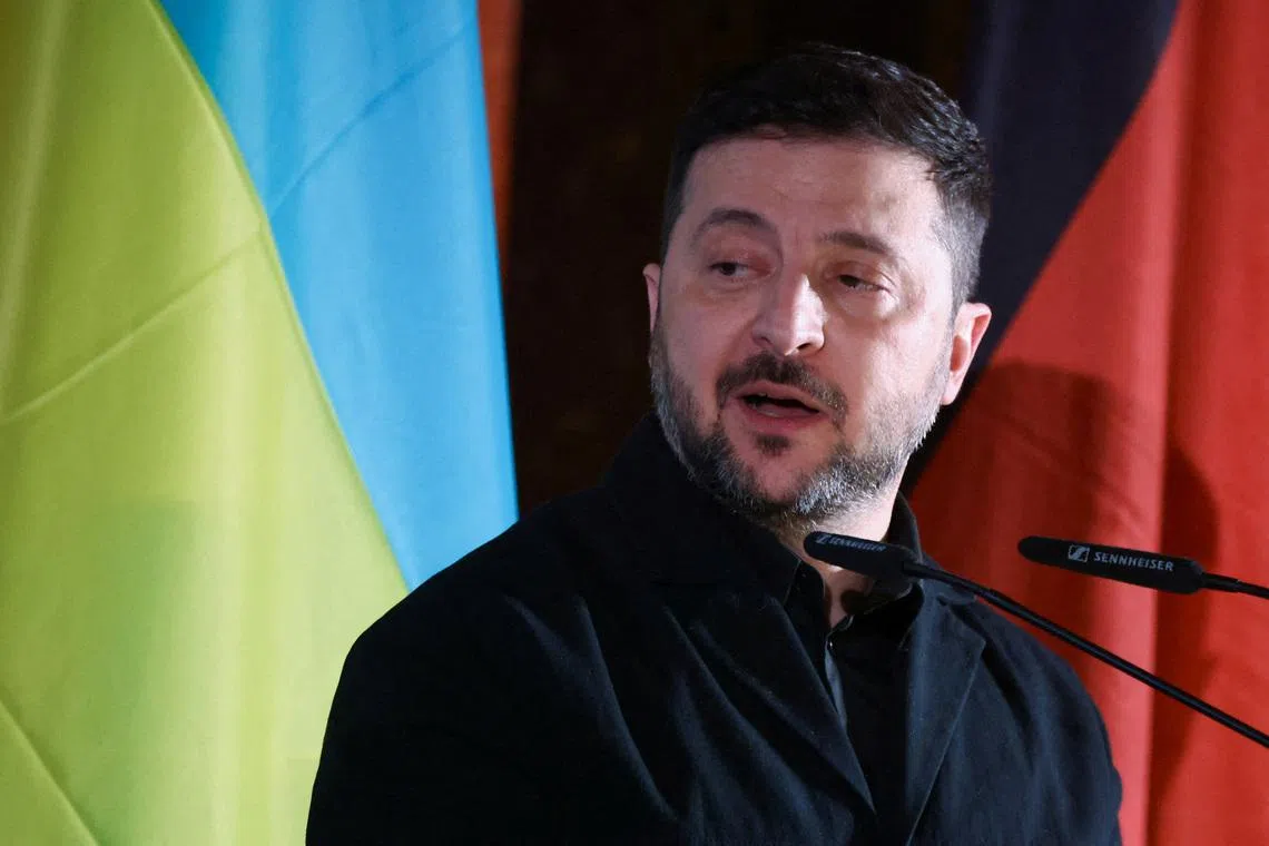 FILE PHOTO: Ukrainian President Volodymyr Zelenskiy speaks on the day he is presented with the Ewald-von-Kleist-Award, during the Munich Security Conference MSC, at the Residenz of the former Bavarian Kings, in Munich, Germany, February 14, 2026. REUTERS/Liesa Johannssen/File Photo