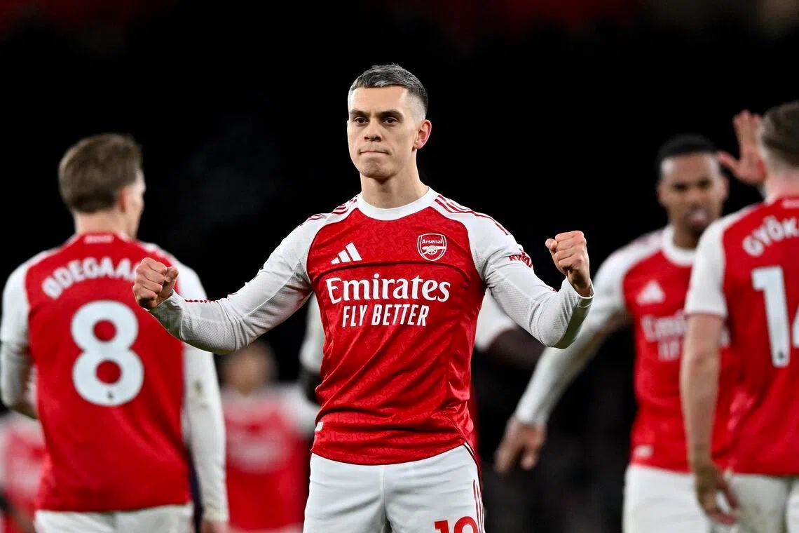 Leandro Trossard (centre) celebrates  scoring Arsenal's third goal.