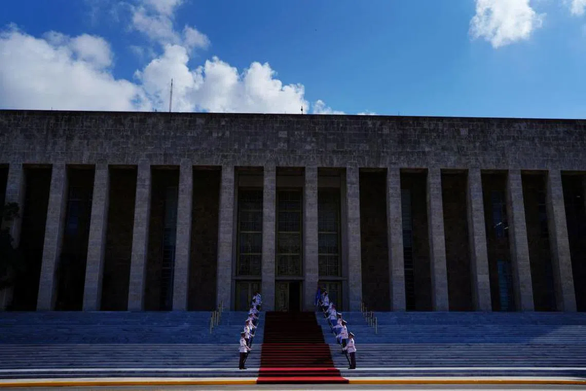 FILE PHOTO: An honour guard stands at the entrance of the Revolution Palace ahead of the G77+China summit in Havana, Cuba, September 14, 2023. REUTERS/Alexandre Meneghini/File Photo