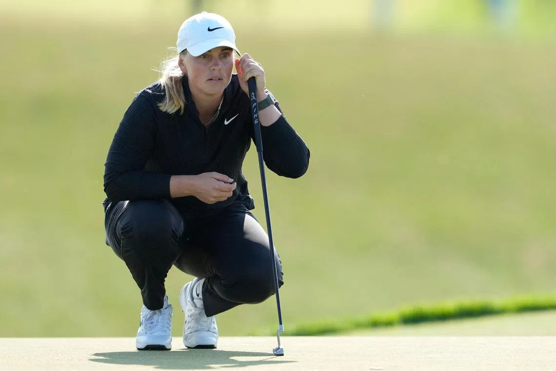 Leader Maja Stark of Sweden lining up a putt on the 18th green during the third round of the US Women's Open at Erin Hills Golf Course on May 31, 2025 in Erin, Wisconsin. She shot a two-under 70 for a seven-under total of 209.