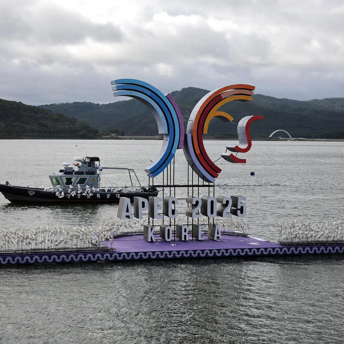 A boat from Sea Special Attack Team (SSAT) patrols the Bomun lake near the venue for the 2025 Asia-Pacific Economic Cooperation leaders' summit in Gyeongju, South Korea on October 20, 2025.   
