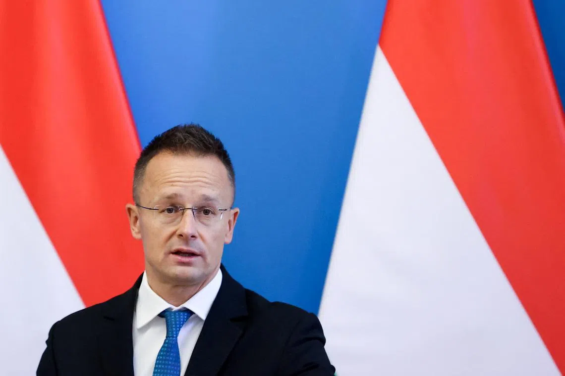 FILE PHOTO: Hungary's Foreign Minister Peter Szijjarto attends a joint press conference with Ukraine's Foreign Minister Andrii Sybiha (not pictured), in Budapest, Hungary September 30, 2024. REUTERS/Bernadett Szabo/File Photo