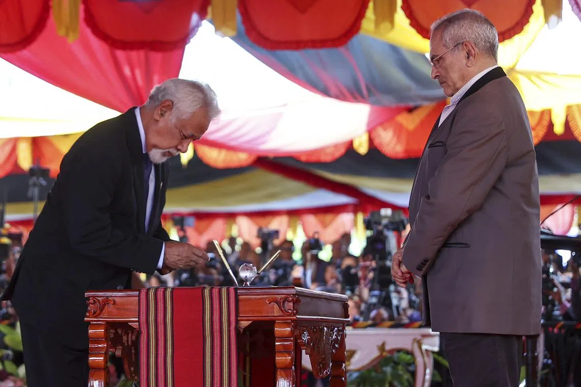 East Timor's President Jose Ramos Horta (right) witnessing the inauguration of Prime Minister Xanana Gusmao at the presidential palace in Dili on July 1, 2023. 