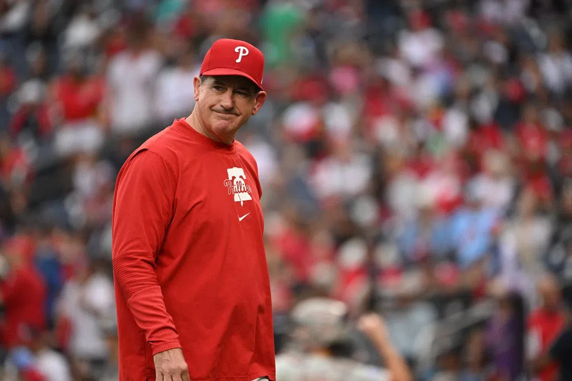 FILE PHOTO: Sep 29, 2024; Washington, District of Columbia, USA; Philadelphia Phillies manager Rob Thomson (59) walks back to the dugout after a visit to the mound against the Washington Nationals during the sixth inning at Nationals Park. Mandatory Credit: Rafael Suanes-Imagn Images/File Photo