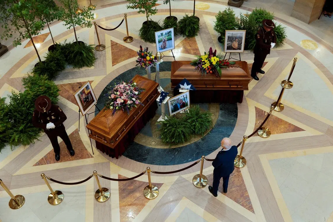 Former U.S. President Joe Biden pays his respects to senior Democratic state assembly woman Melissa Hortman and her husband Mark lie in State at the Minnesota Capitol after they were killed in a shooting, in St. Paul, Minnesota, U.S., June 27, 2025.   REUTERS/Tim Evans