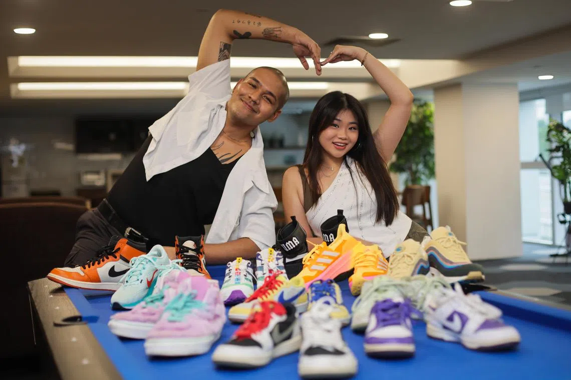 (From left): Profile of Joshua Simon and Shawnia Seah, both deejays from Kiss92, with part of their sneaker collections photographed at News Centre on Nov 29, 2024. 

They also hold iPads to show them designing their own sneakers as part of the Sneaker Con SEA and SPH Media Design Your Sneaker competition, for young people aged 16 to 25. The contest is to be launched in December, and the top designer can win $3,000 cash and limited-edition sneakers (or equivalent).
