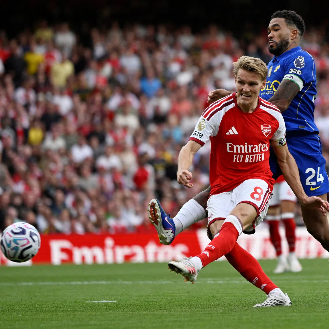 Arsenal’s Martin Odegaard scores their second goal against Chelsea at the Emirates Stadium, London.