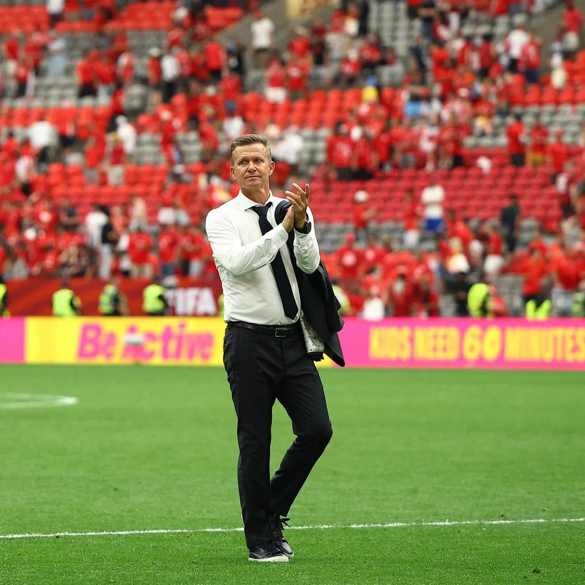 Soccer Football - FIFA World Cup 2026 - Group B - Switzerland v Canada - BC Place, Vancouver, Canada - June 24, 2026 Canada coach Jesse Marsch applauds fans after the match REUTERS/Agustin Marcarian
