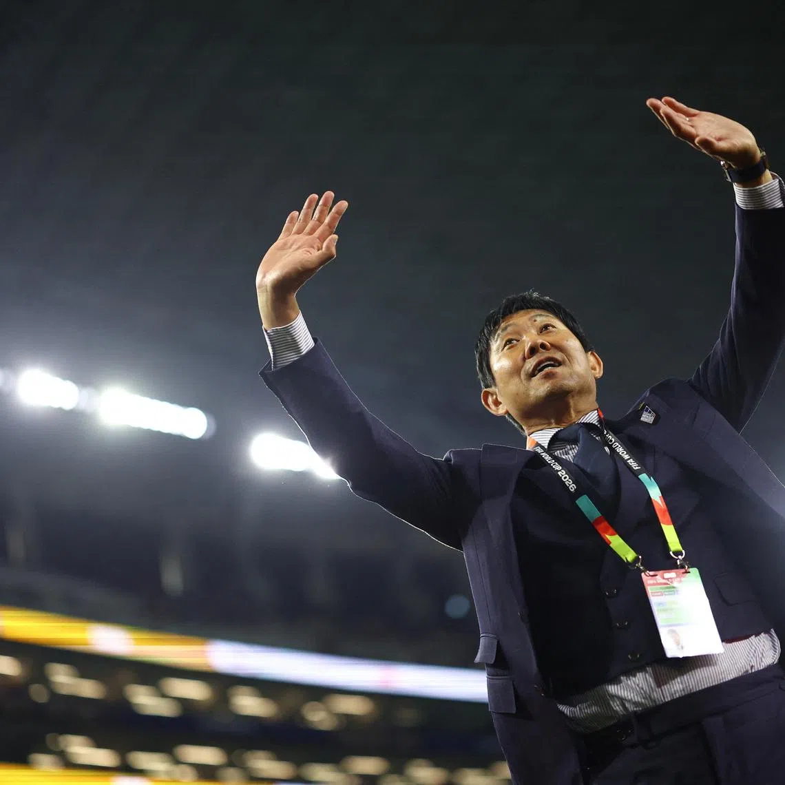 Soccer Football - FIFA World Cup 2026 - Group F - Japan v Sweden - Dallas Stadium, Arlington, Texas, U.S. - June 25, 2026 Japan coach Hajime Moriyasu celebrates after the match REUTERS/Hannah Mckay