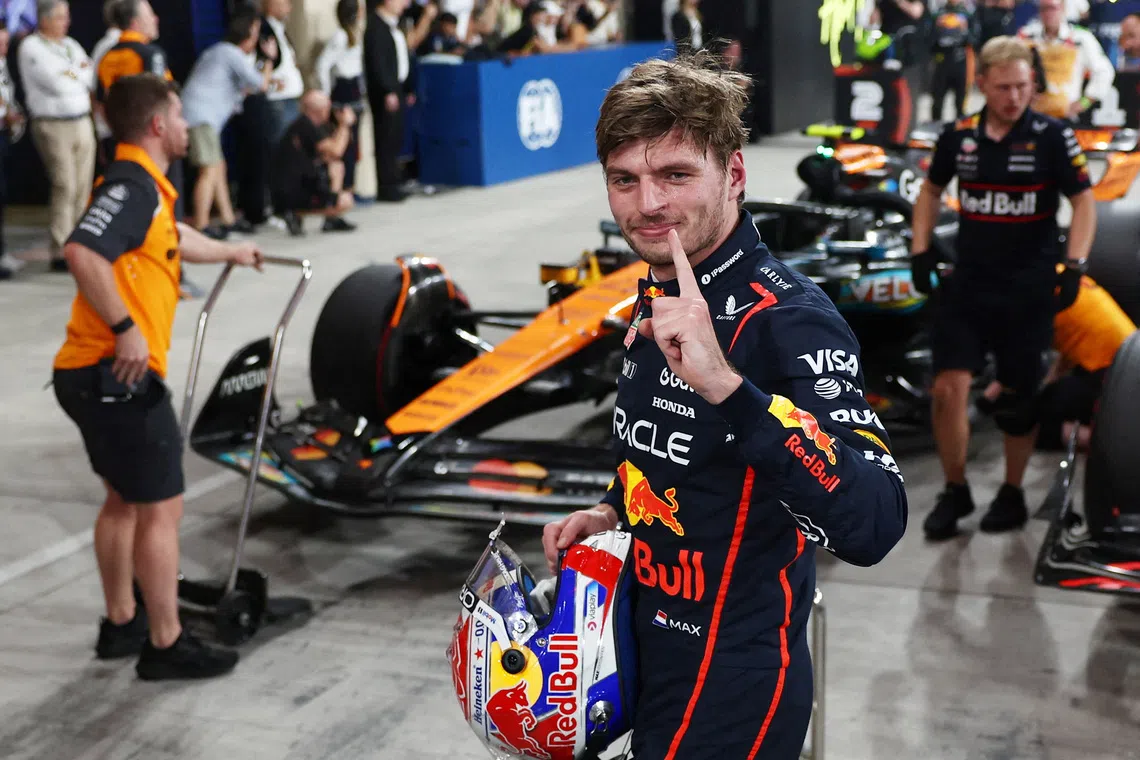 Formula One F1 - Abu Dhabi Grand Prix - Yas Marina Circuit, Abu Dhabi, United Arab Emirates - December 6, 2025 Red Bull's Max Verstappen celebrates after qualifying in pole position REUTERS/Jakub Porzycki
