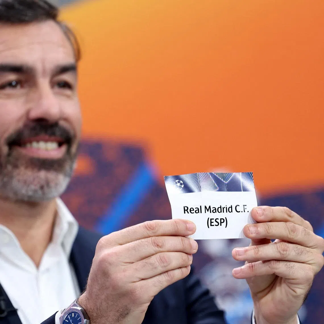 Soccer Football - UEFA Champions League - Knockout Phase Playoffs Draw - UEFA Headquarters, Nyon, Switzerland - January 30, 2026 Former player Robert Pires draws Real Madrid REUTERS/Pierre Albouy
