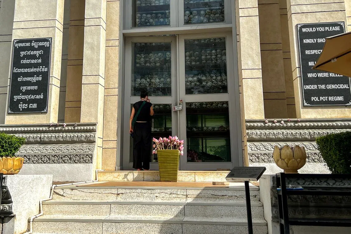 A tourist visits the Tuol Sleng Genocide Museum after the site was added to UNESCO's World Heritage List on July 11, in Phnom Penh, Cambodia, July 12, 2025. REUTERS/Chantha Lach