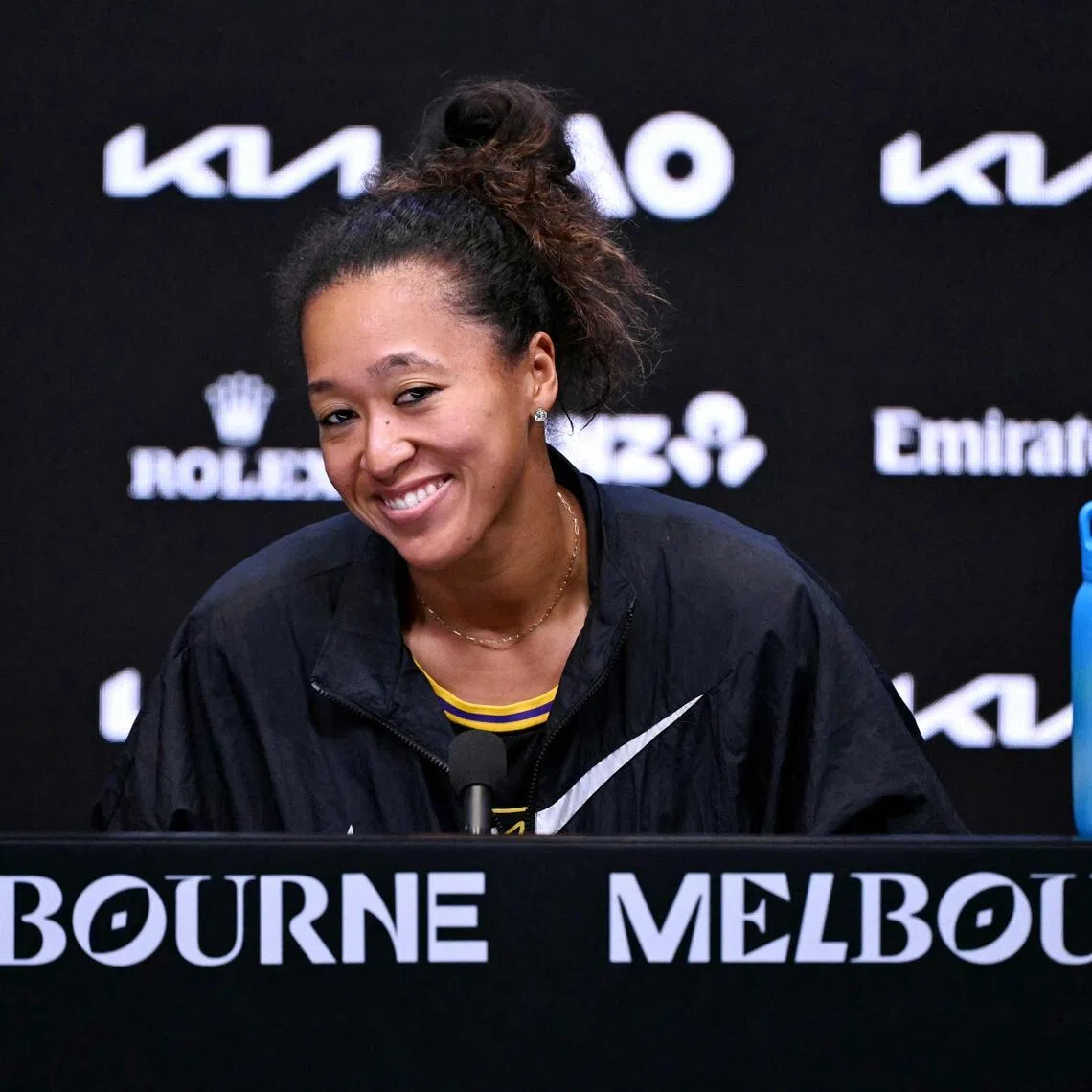 TOPSHOT - Japan's Naomi Osaka attends a press conference after winning her women's singles match against Romania's Sorana Cirstea on day five of the Australian Open tennis tournament in Melbourne on January 22, 2026. (Photo by WILLIAM WEST / AFP) / -- IMAGE RESTRICTED TO EDITORIAL USE - STRICTLY NO COMMERCIAL USE --