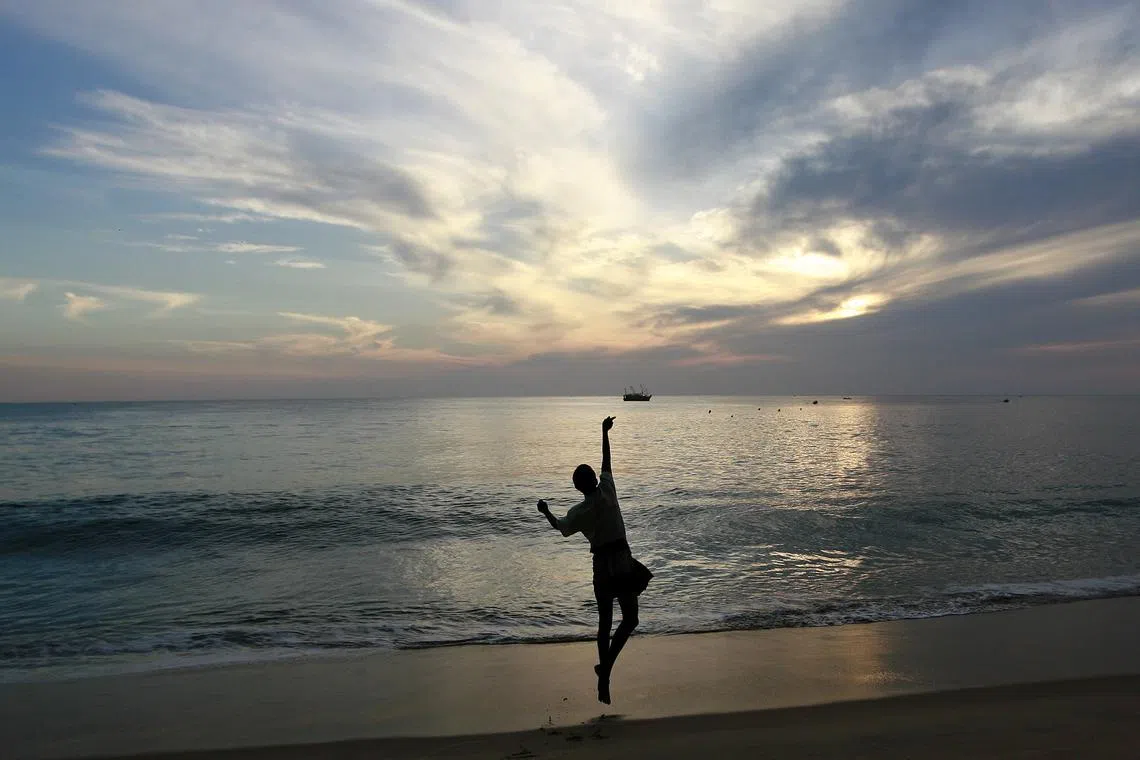 FILE PHOTO: A fisherman throws his line in the morning in Arugam Bay, east of Colombo, Sri Lanka. REUTERS/Andrew Caballero-Reynolds/File Photo