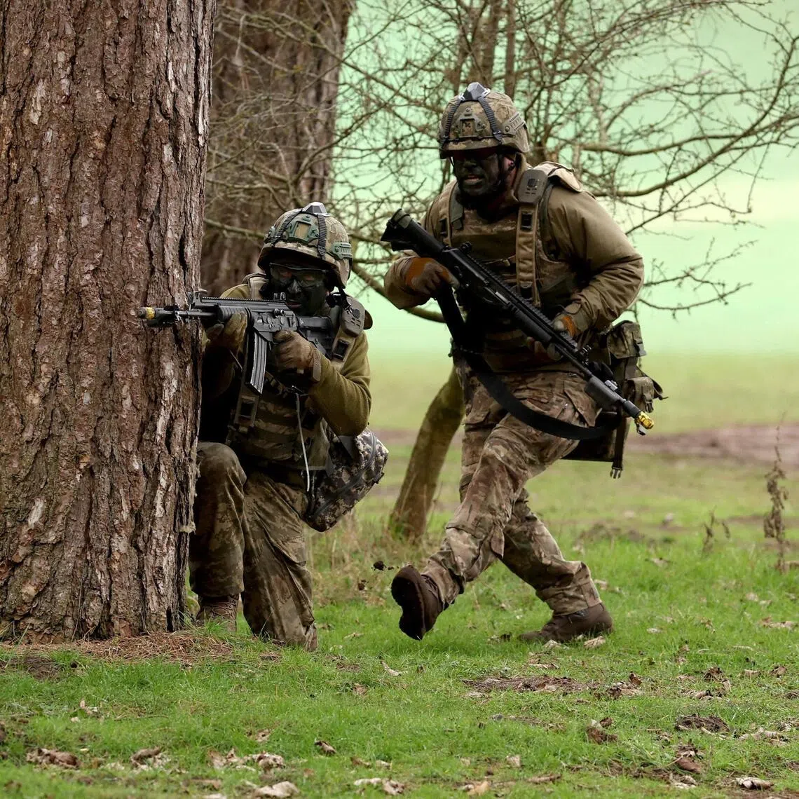 Ukrainian soldiers taking part in a tactical exercise at a British Army training camp on Feb 24 - the fourth anniversary of Russia's 2022 full-scale invasion of Ukraine. 
