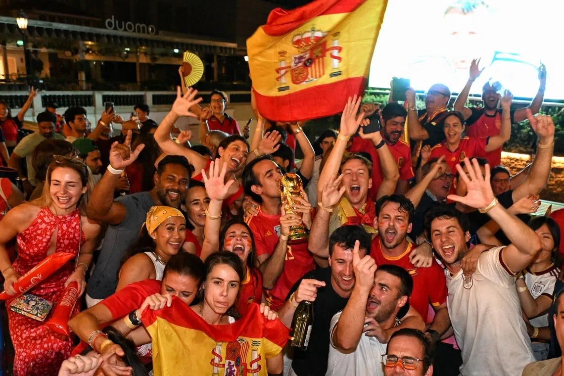 Spanish fans celebrating after the live screening of the FIFA World Cup 2026 final between Argentina and Spain at CHIJMES on July 20, 2026. ST PHOTO: AZMI ATHNI