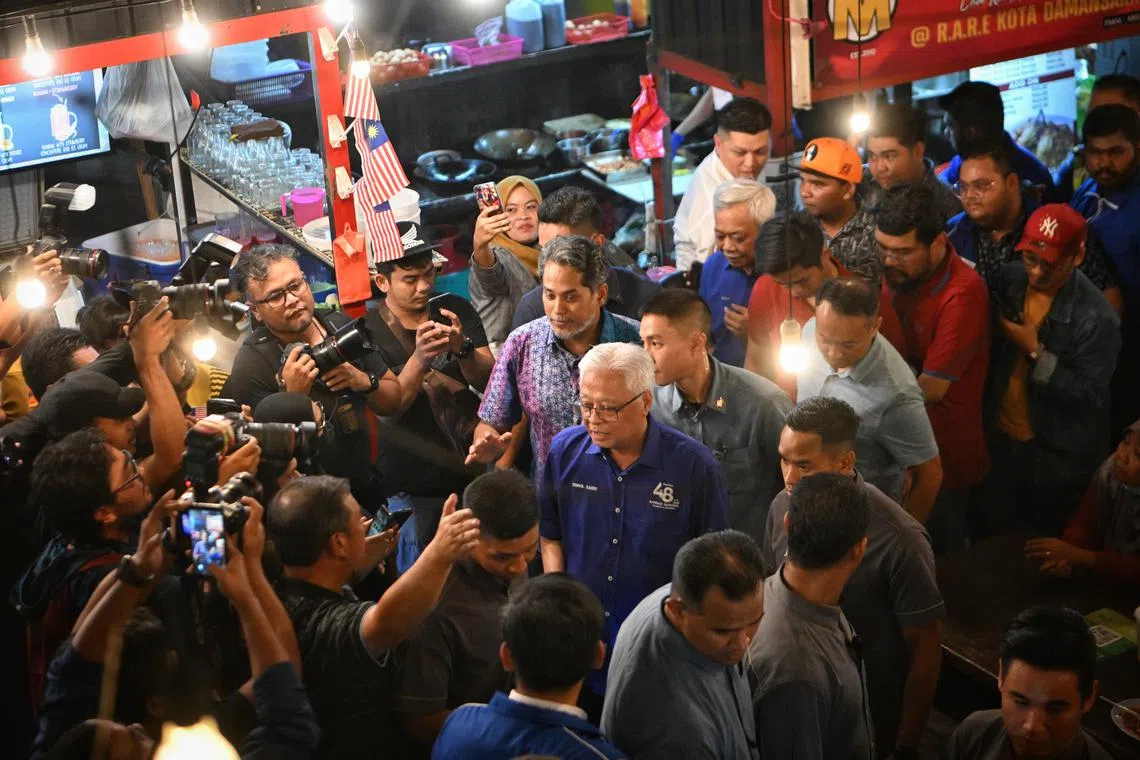 Malaysia's caretaker Prime Minister Ismail Sabri Yaakob campaigning at Real Tomyam in Uptown Damansara, on Nov 14, 2022.  