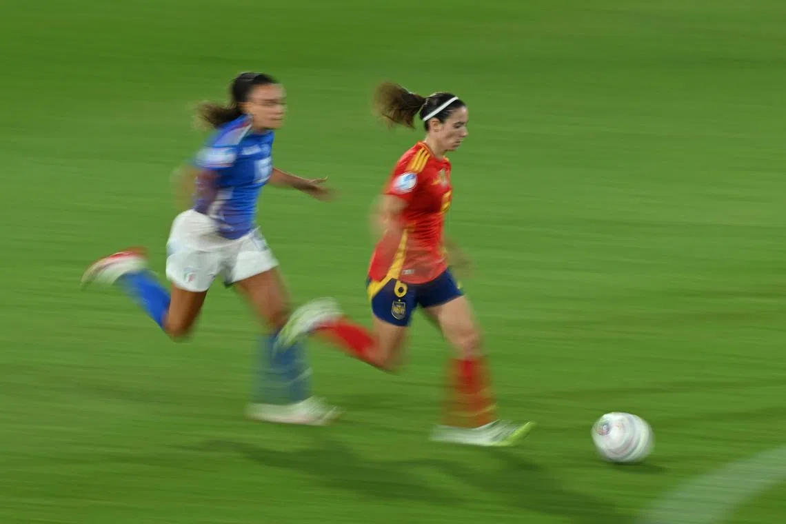 Italy's Annamaria Serturini trying to close down Spain's Aitana Bonmati in their Women's Euro 2025 Group B clash at Stadion Wankdorf in Bern, Switzerland on July 11, 2025.