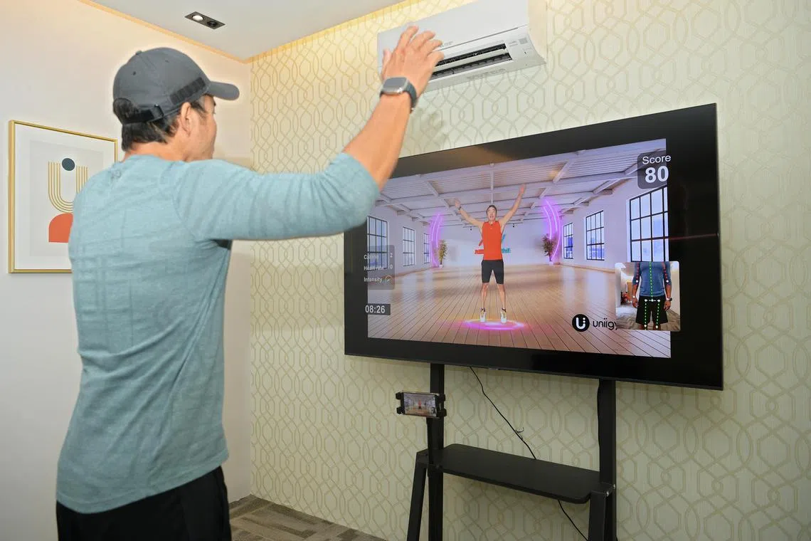anaigym/ST20221005_202207933242/Ng Sor Luan/The new AIBI Maxwell gym at 30 Maxwell Road has an AI fitness app, featuring trainers like TV host Allan Wu.