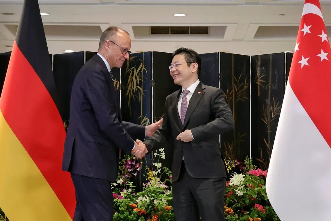 Prime Minister and Minister for Finance Lawrence Wong (right) and Chancellor of Germany Friedrich Merz held a joint press conference at the Parliament House on Oct 27.