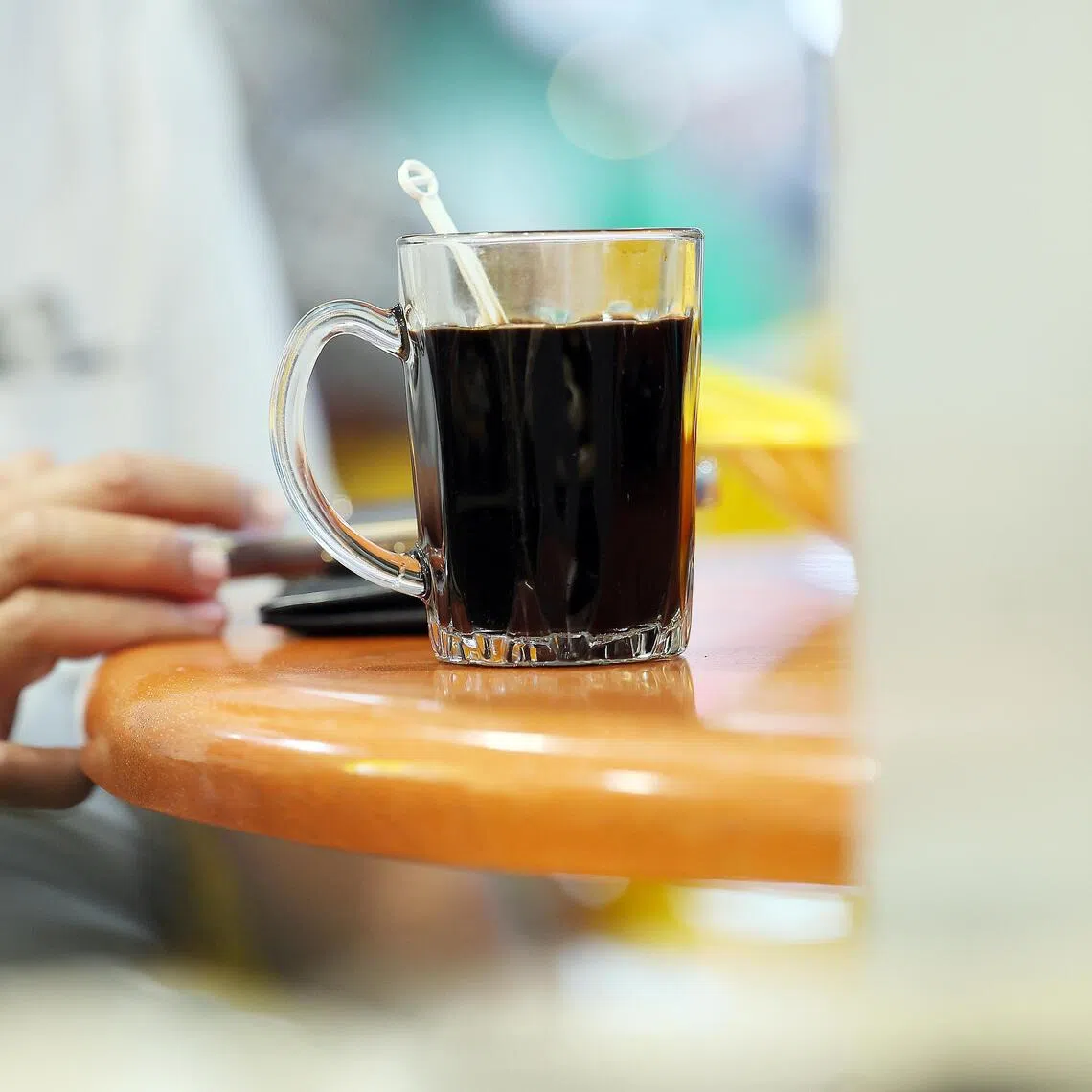 There are many ways to order a cup of kopi in Singapore. What do you say if you want a strong black coffee?