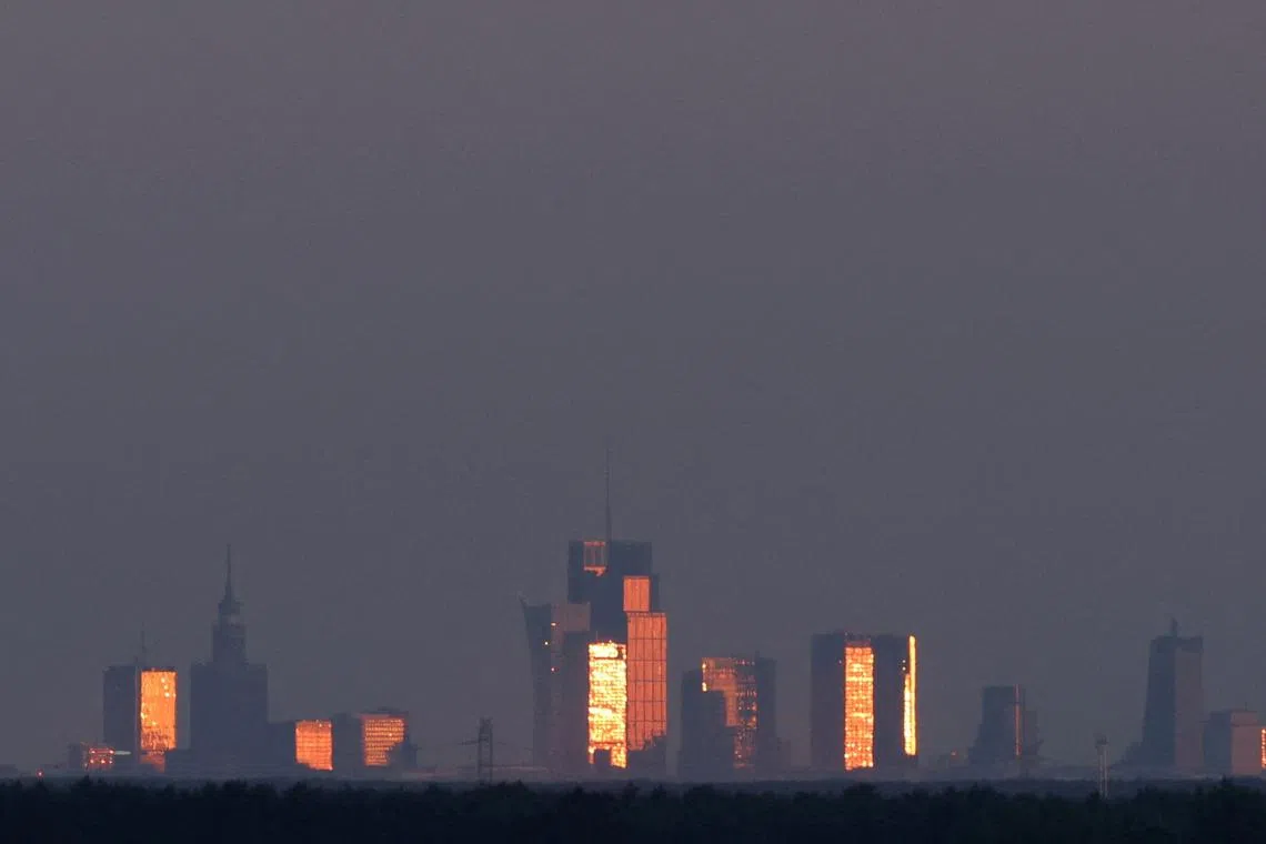 FILE PHOTO: A general view of Warsaw skyscrapers is seen from the  field near Popowo Koscielne Poland July 28, 2022. REUTERS/Kacper Pempel/File Photo