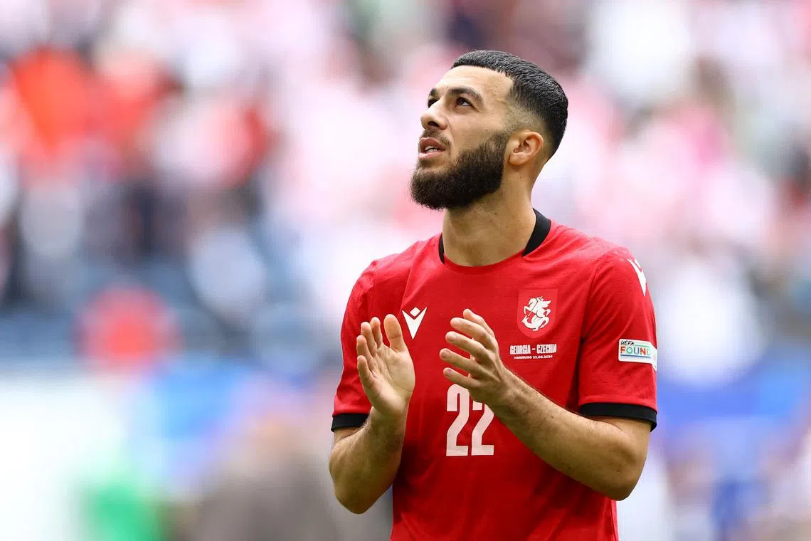FILE PHOTO: Soccer Football - Euro 2024 - Group F - Georgia v Czech Republic - Hamburg Volksparkstadion, Hamburg, Germany - June 22, 2024 Georgia's Georges Mikautadze applauds fans after the match REUTERS/Lisi Niesner/File Photo