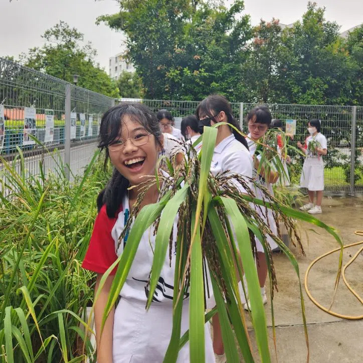 (Clockwise from left) Teenagers Mon Myat Thu from Yuying Secondary School, Ignatius Tang from St Andrew's Secondary School, and Aanya Agarwal from Greendale Secondary School with their respective projects.