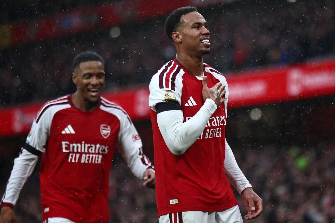 Arsenal’s Gabriel Magalhaes (right) celebrates scoring the Gunners’ second goal against Everton with Ezri Konsa, who scored their first.