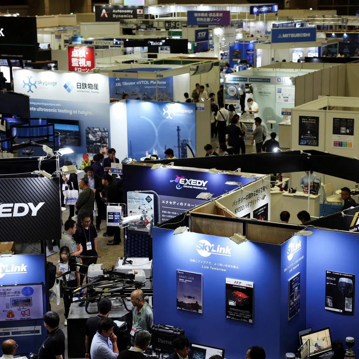 Visitors crowd at the Japan Drone 2026 and International Advanced Air Mobility Expo, in Chiba, Japan.