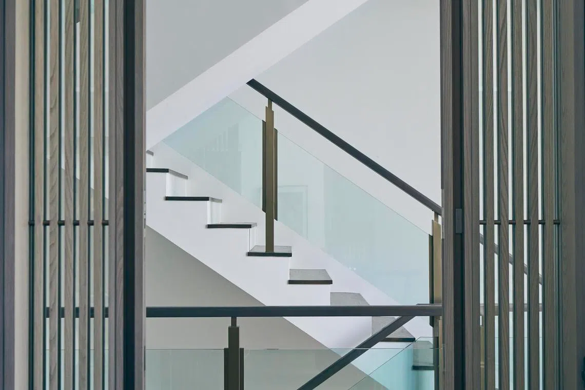 Bespoke pocket doors create a sense of grandeur.