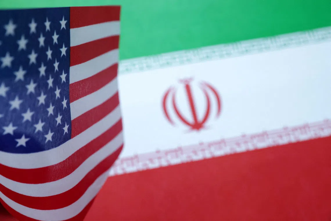 FILE PHOTO: U.S. and Iran flags are seen in this illustration created on June 18, 2025. REUTERS/Dado Ruvic/Illustration/File Photo